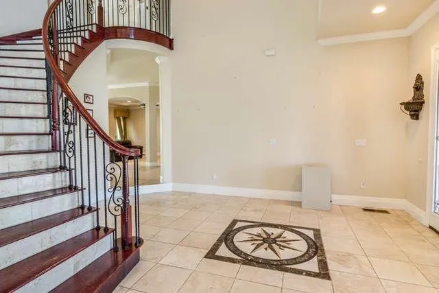 a view of a livingroom with furniture and entryway