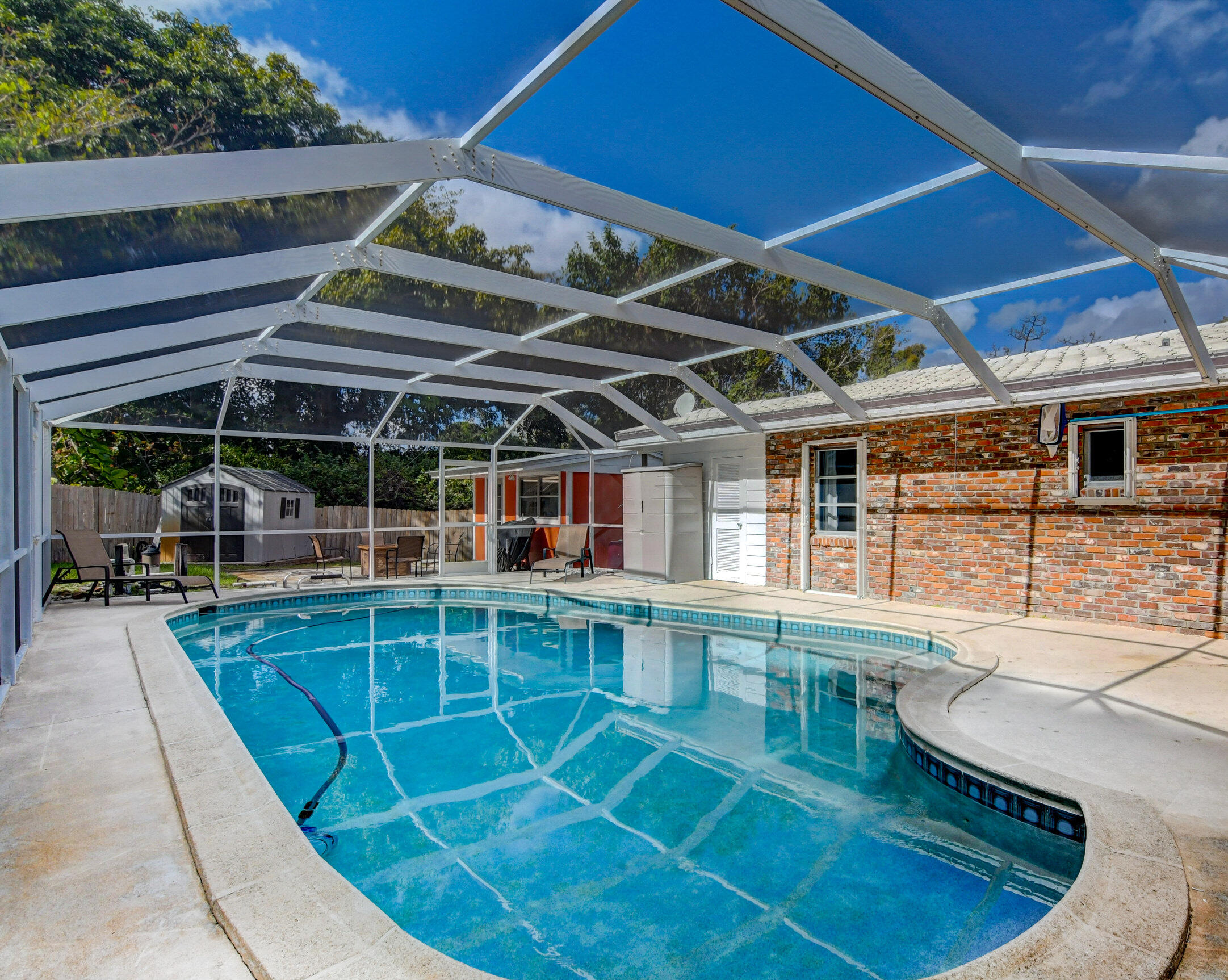 6465 High Ridge Road Lake Worth, FL 33462 - Photo 32 of 51 6465 High Ridge Oversized Pool 2
