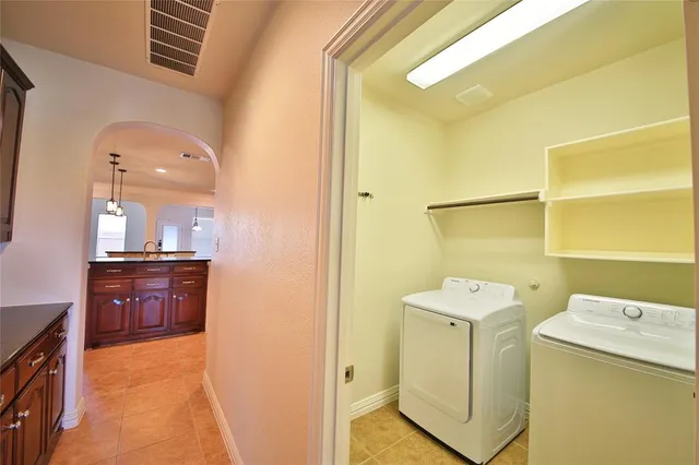 a view of a kitchen with granite countertop cabinets and a wooden floor