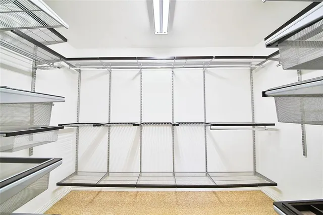 a bathroom with a toilet a sink and a shower