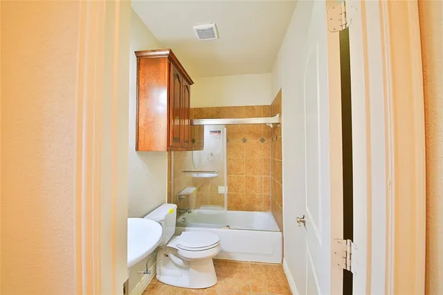 a view of a hallway with a balcony