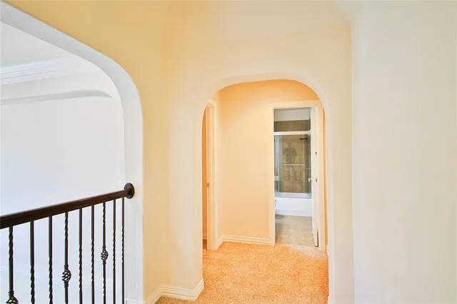 a view of an house with backyard and road