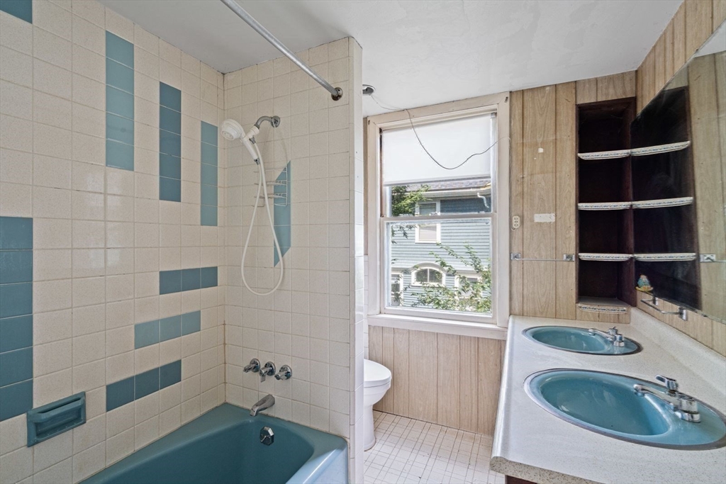 61 Chester Street Newton, MA 02461 - Photo 25 of 42 a bathroom with a sink a toilet and shower