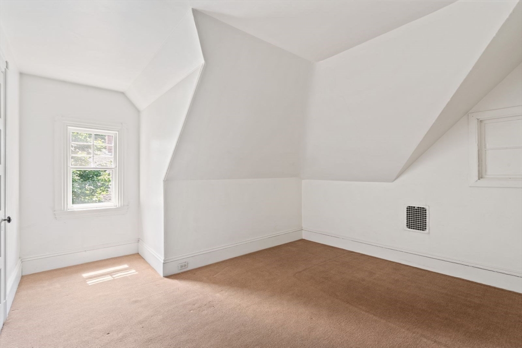 61 Chester Street Newton, MA 02461 - Photo 27 of 42 an empty room with windows