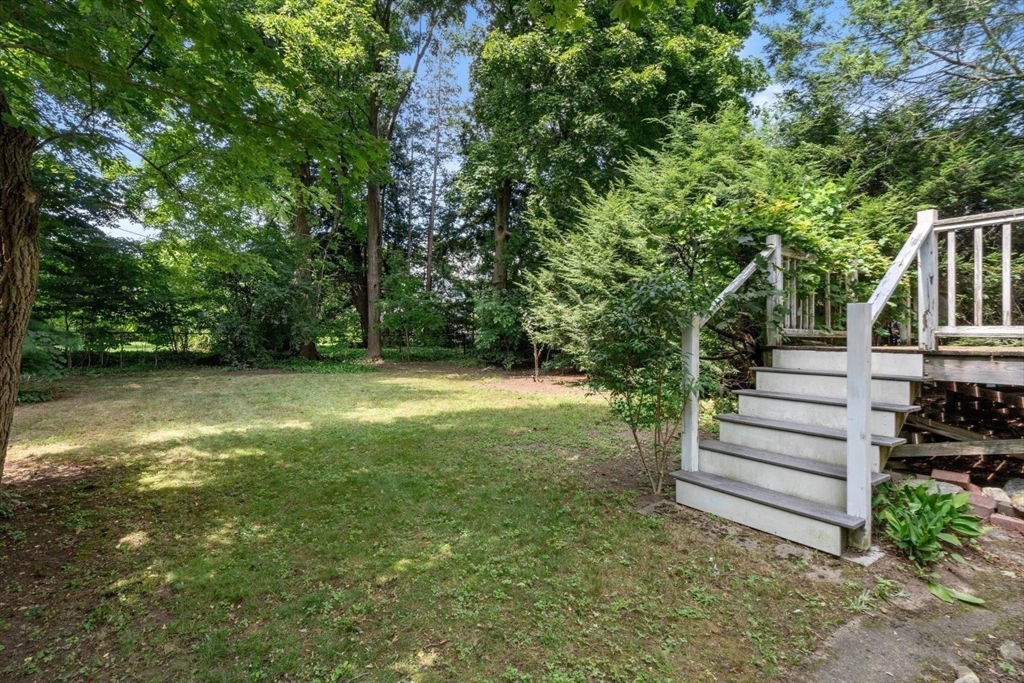 61 Chester Street Newton, MA 02461 - Photo 31 of 42 a view of a house with a yard