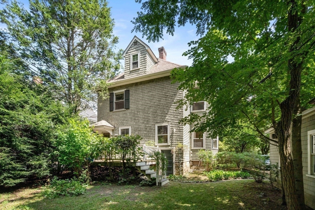 61 Chester Street Newton, MA 02461 - Photo 33 of 42 a house with a tree in front of it