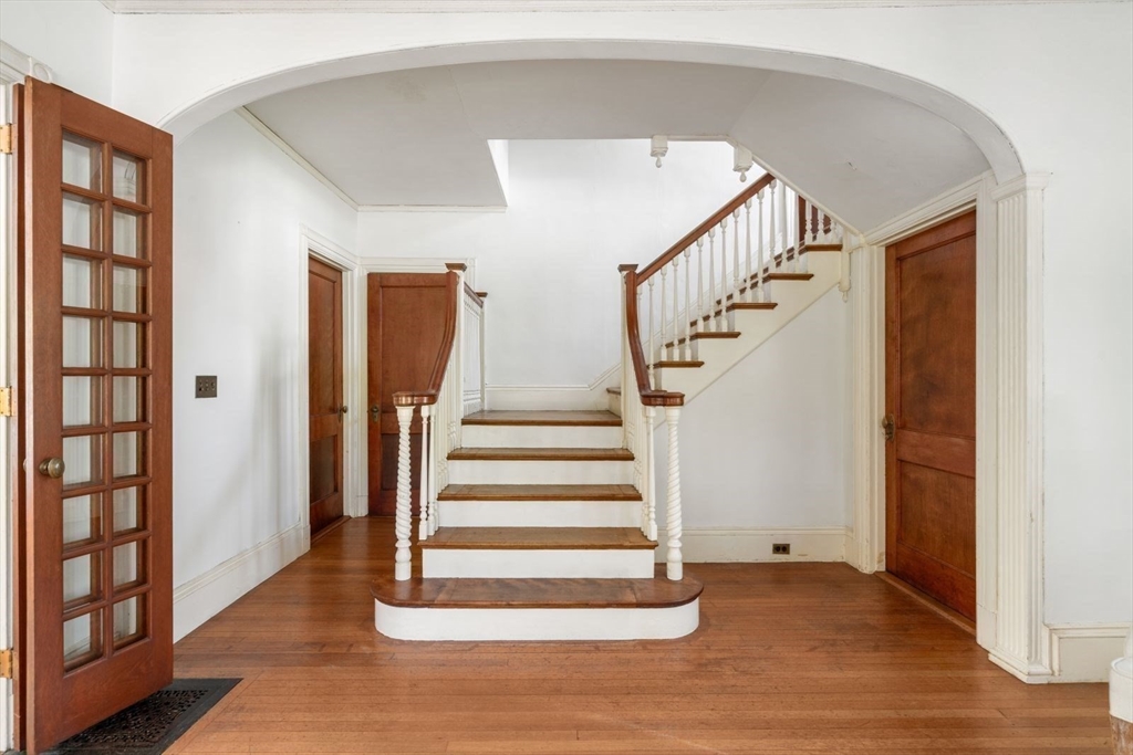 61 Chester Street Newton, MA 02461 - Photo 4 of 42 a view of entryway and hall with wooden floor