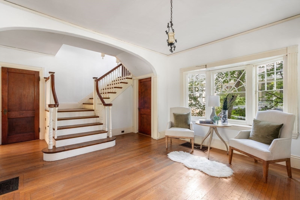 61 Chester Street Newton, MA 02461 - Photo 5 of 42 a living room with wooden floor furniture and a window
