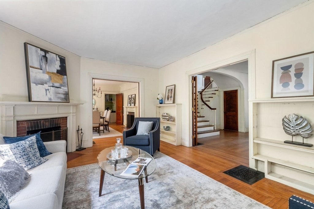 61 Chester Street Newton, MA 02461 - Photo 7 of 42 a living room with furniture and a fireplace