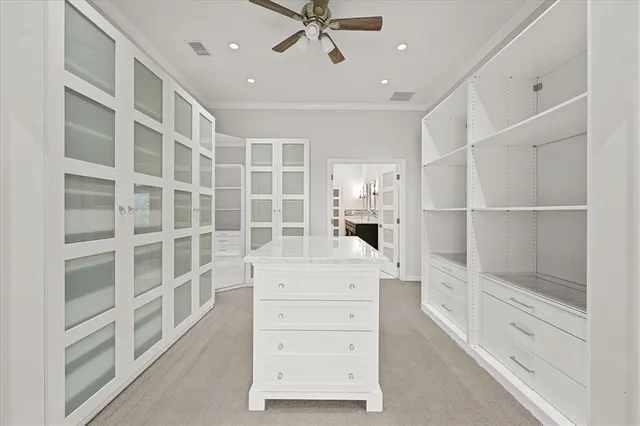 a view of an empty walk in closet