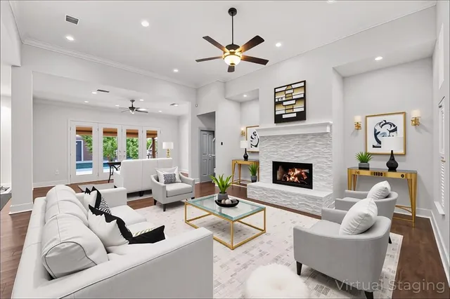 a living room with furniture and a fireplace