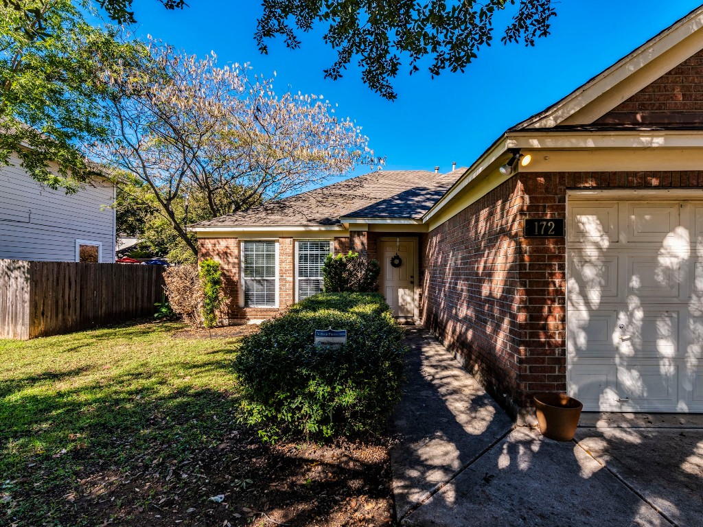 172 Winter Street Kyle, TX 78640 - Photo 5 of 14 a view of a house with backyard and sitting area