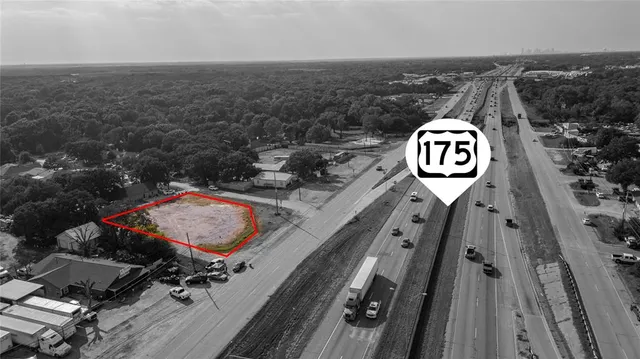a view of swimming pool with a yard and plants