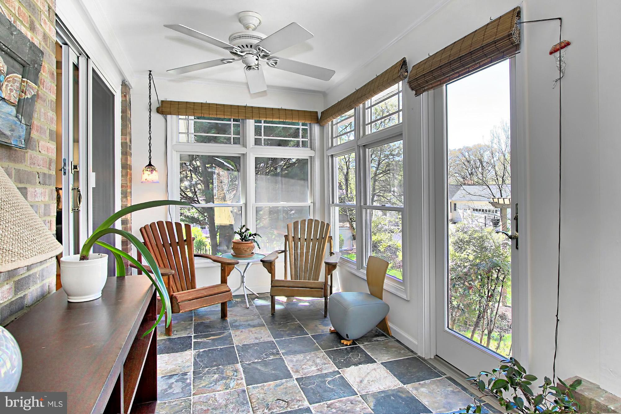 8228 Higham Road Lorton, VA 22079 - Photo 18 of 30 Enclosed Rear Porch Overlooking Private Backyard
