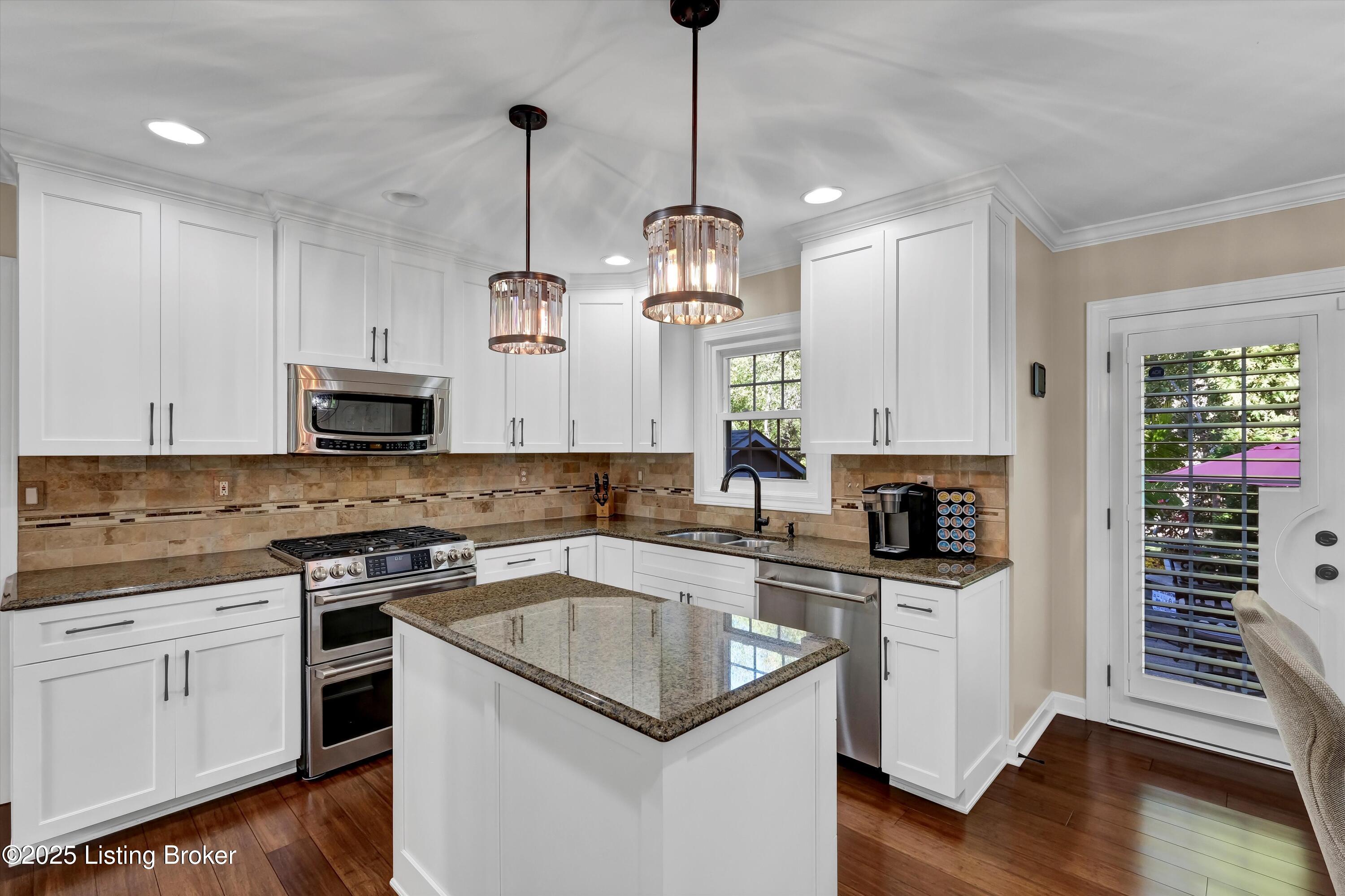 10612 Edgewater Road Louisville, KY 40223 - Photo 26 of 55 Kitchen - upgraded light fixtures, cabinets and floor