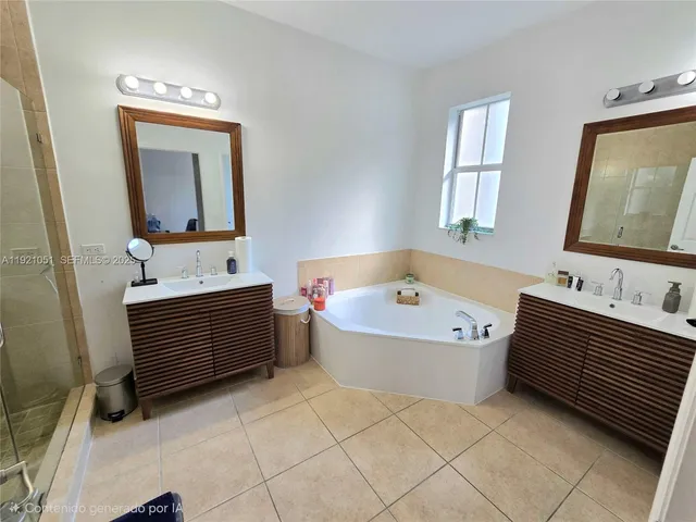 a view of a balcony with wooden floor and fence