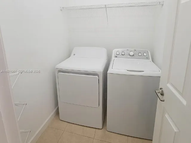 a view of room with stairs and a window