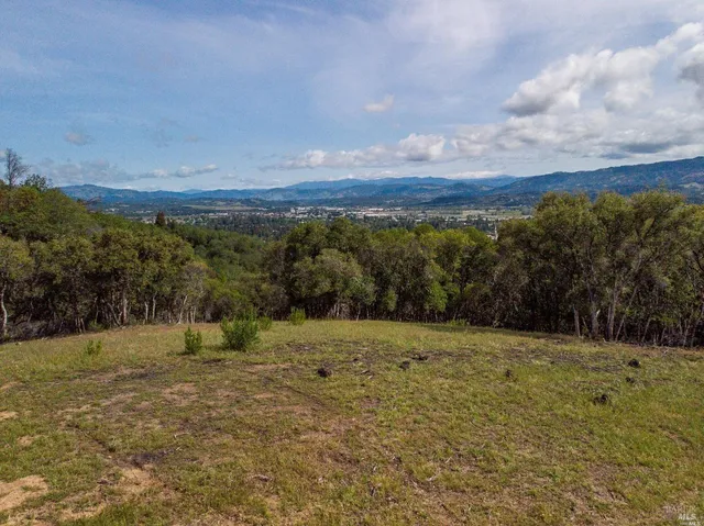 a view of outdoor space with mountain view
