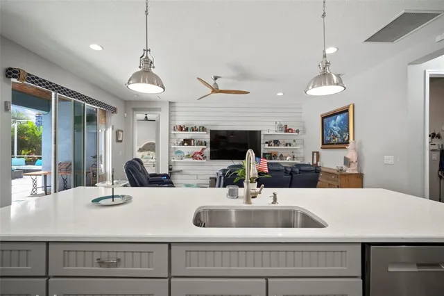 a bedroom with a bed and a flat screen tv in it