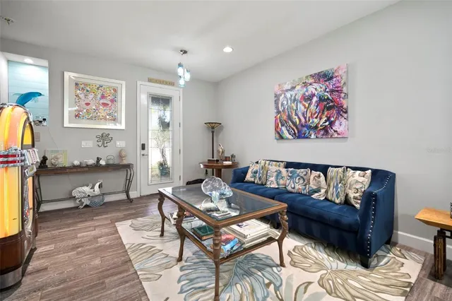 a dining room with furniture window wooden floor