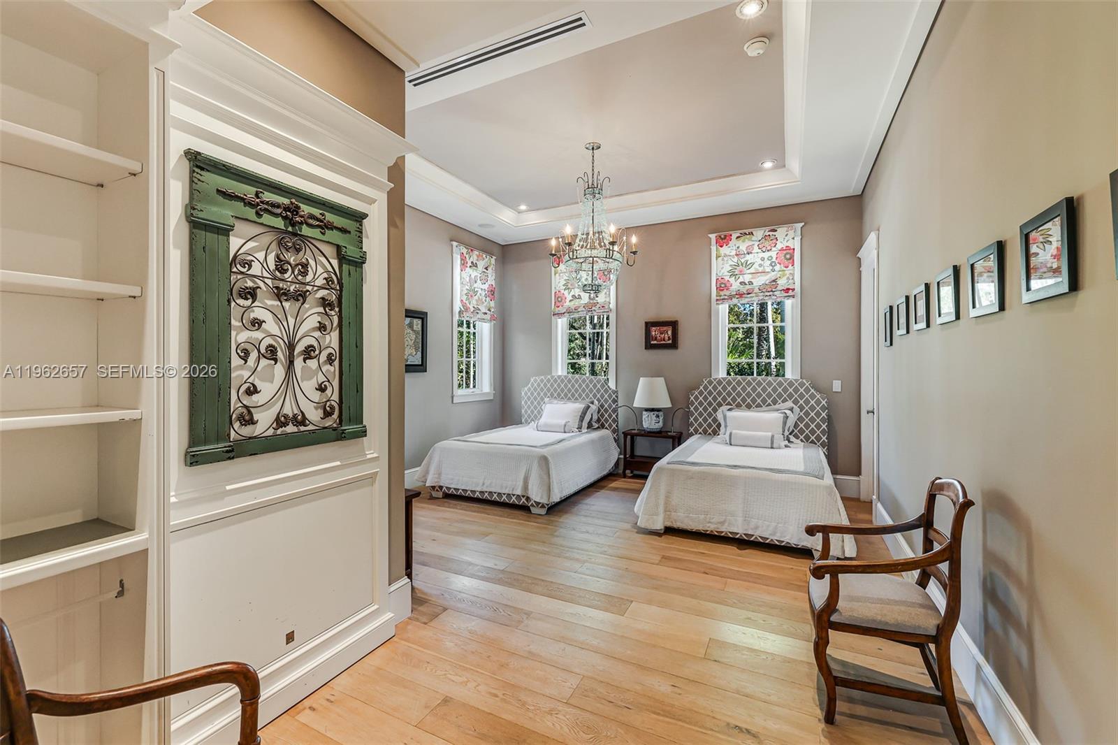 9320 Balada Street Coral Gables, FL 33156 - Photo 27 of 75 a living room with furniture and a large window