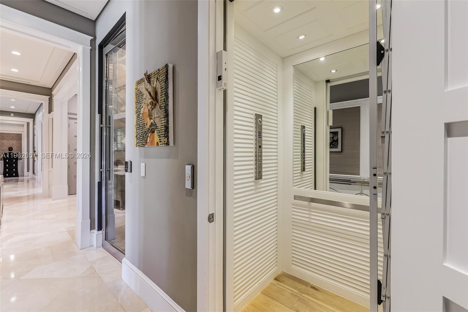9320 Balada Street Coral Gables, FL 33156 - Photo 29 of 75 a view of a hallway with a elevator
