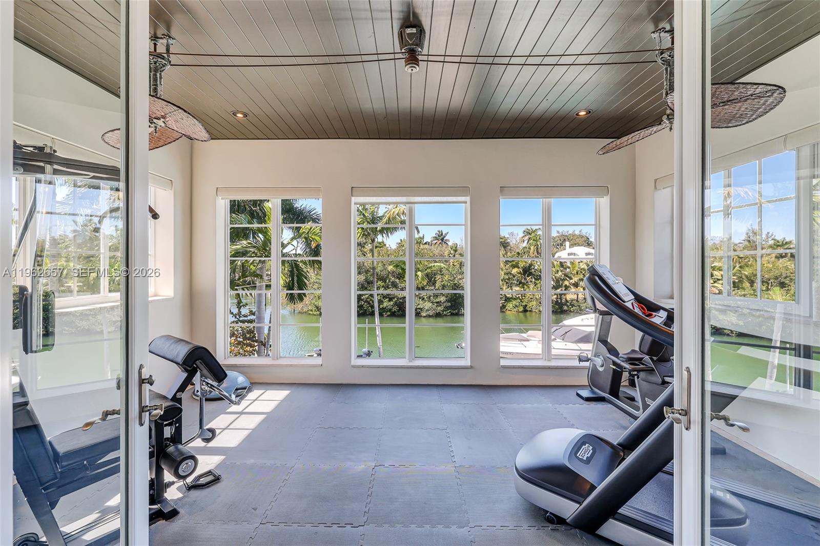 9320 Balada Street Coral Gables, FL 33156 - Photo 36 of 75 a view of a room with gym equipment