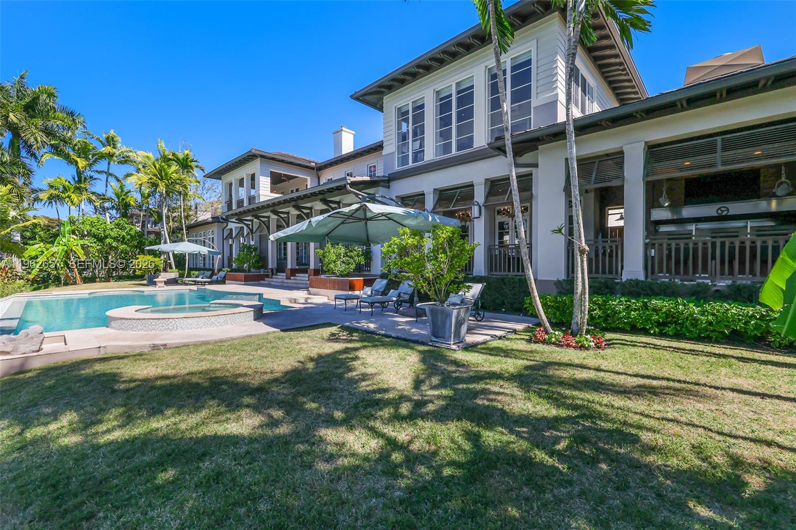 9320 Balada Street Coral Gables, FL 33156 - Photo 5 of 75 a view of a house with swimming pool and sitting area