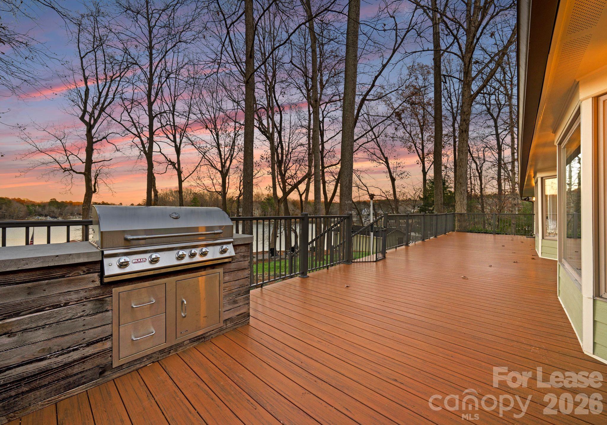 19709 Stough Farm Road Cornelius, NC 28031 - Photo 27 of 48 a backyard of a house with lots of green space