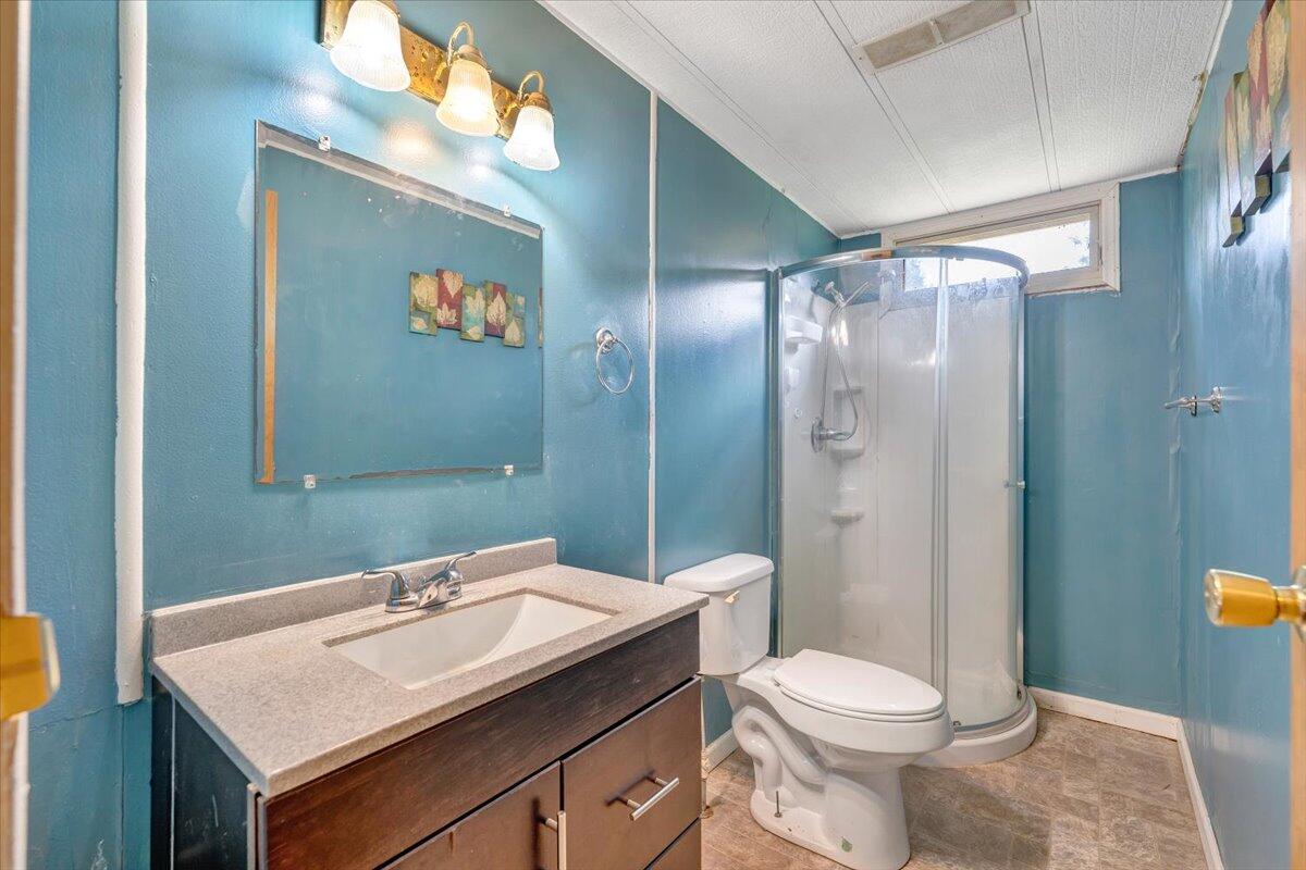 164 Tabernacle Road Penhook, VA 24137 - Photo 15 of 58 a bathroom with a sink toilet and shower