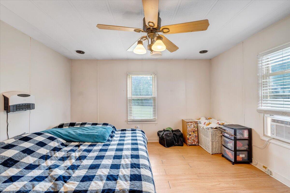 164 Tabernacle Road Penhook, VA 24137 - Photo 17 of 58 a bedroom with a bed and a window
