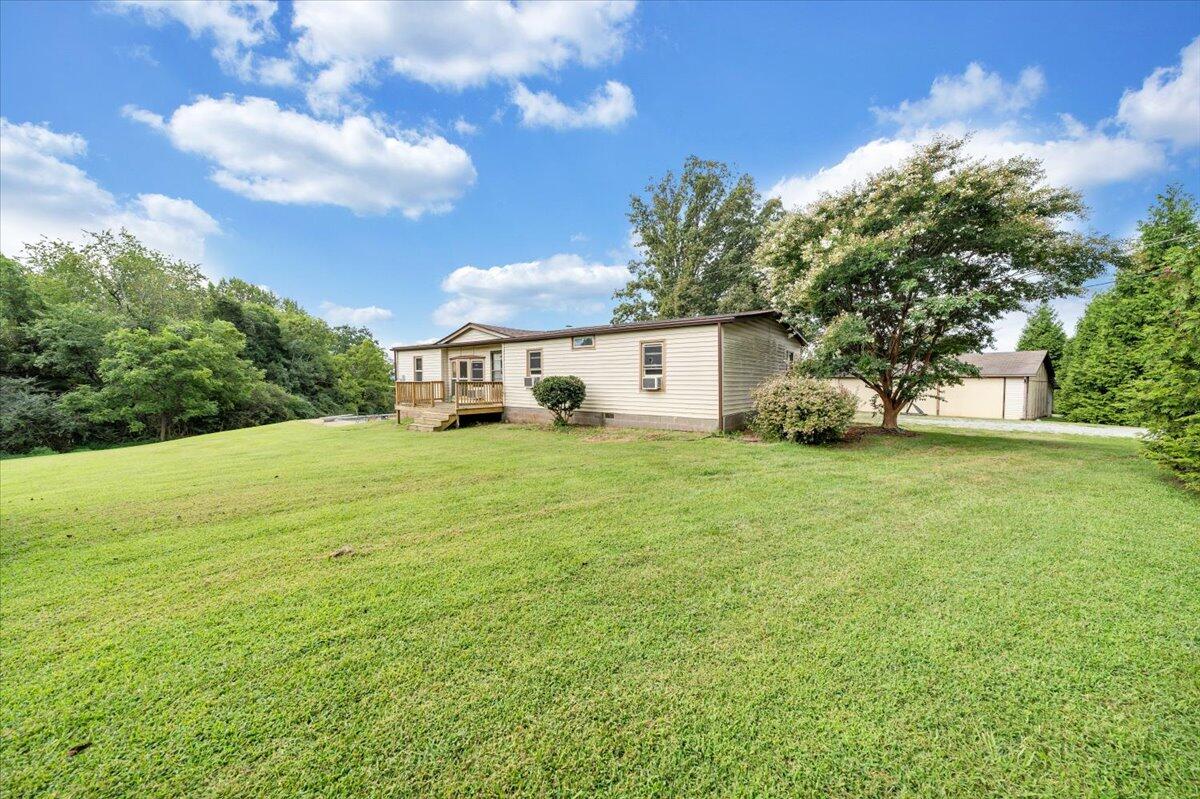 164 Tabernacle Road Penhook, VA 24137 - Photo 2 of 58 a view of a house with a big yard