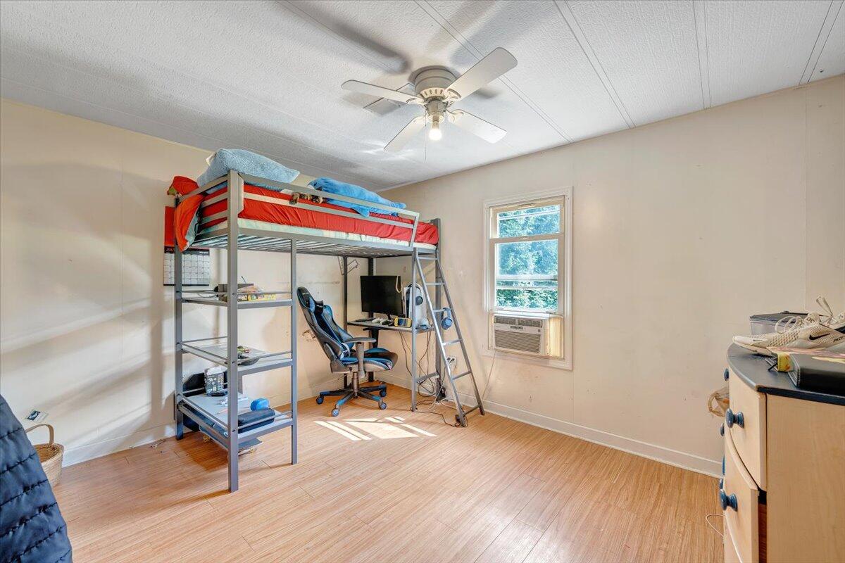 164 Tabernacle Road Penhook, VA 24137 - Photo 24 of 58 a work room with furniture and a window