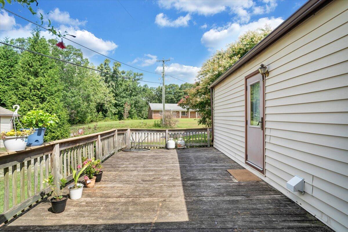 164 Tabernacle Road Penhook, VA 24137 - Photo 32 of 58 a view of a balcony with wooden floor