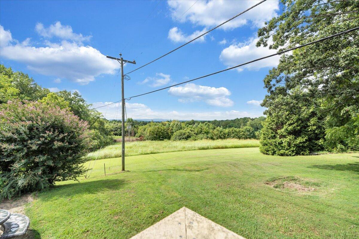 164 Tabernacle Road Penhook, VA 24137 - Photo 35 of 58 a view of a field with a tree in the background