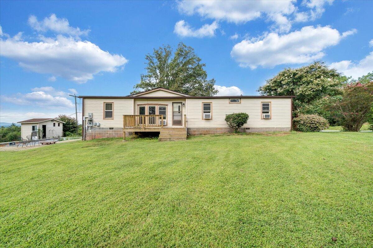 164 Tabernacle Road Penhook, VA 24137 - Photo 39 of 58 a view of a house with a back yard