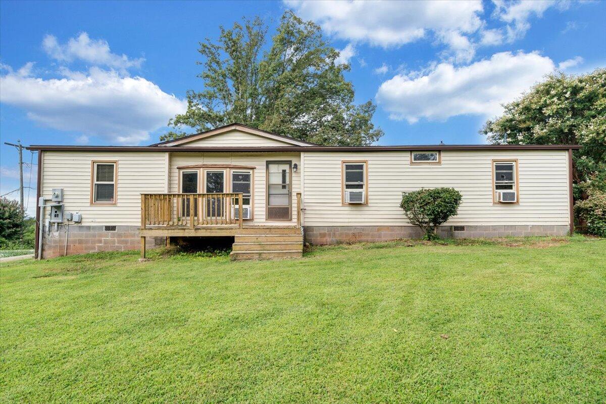 164 Tabernacle Road Penhook, VA 24137 - Photo 40 of 58 a house with garden in front of it