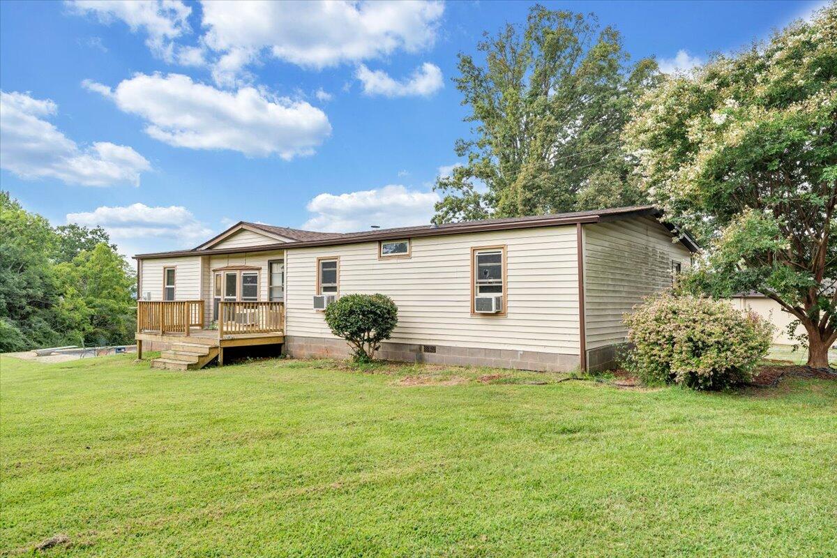164 Tabernacle Road Penhook, VA 24137 - Photo 41 of 58 a front view of a house with garden