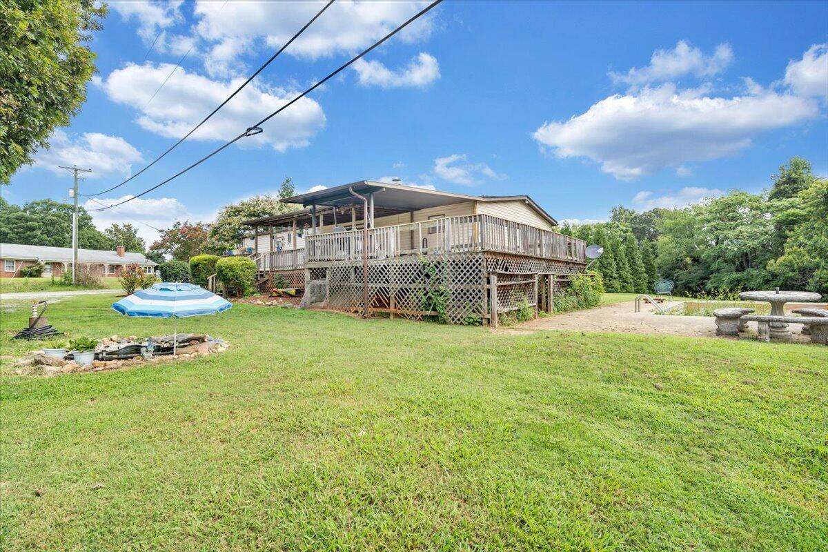 164 Tabernacle Road Penhook, VA 24137 - Photo 46 of 58 a view of a house with a big yard and sitting area