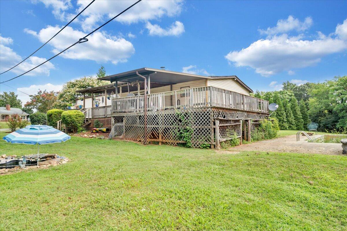 164 Tabernacle Road Penhook, VA 24137 - Photo 47 of 58 a view of a house with a yard porch and sitting area