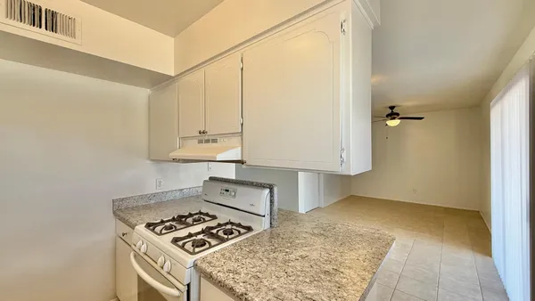 a view of kitchen and utility room