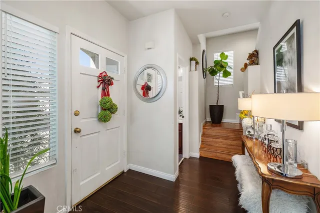 a very nice looking room with wooden floor