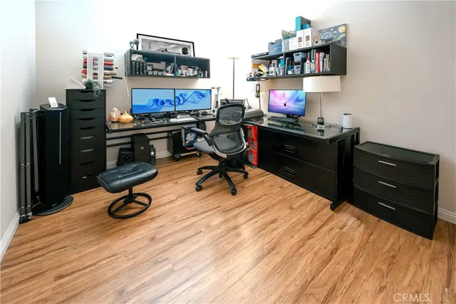 a view of a workspace with furniture
