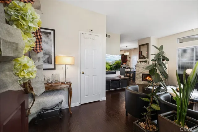 a view of a workspace with furniture and a potted plant