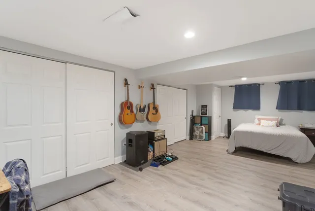 a bed room with furniture and a table