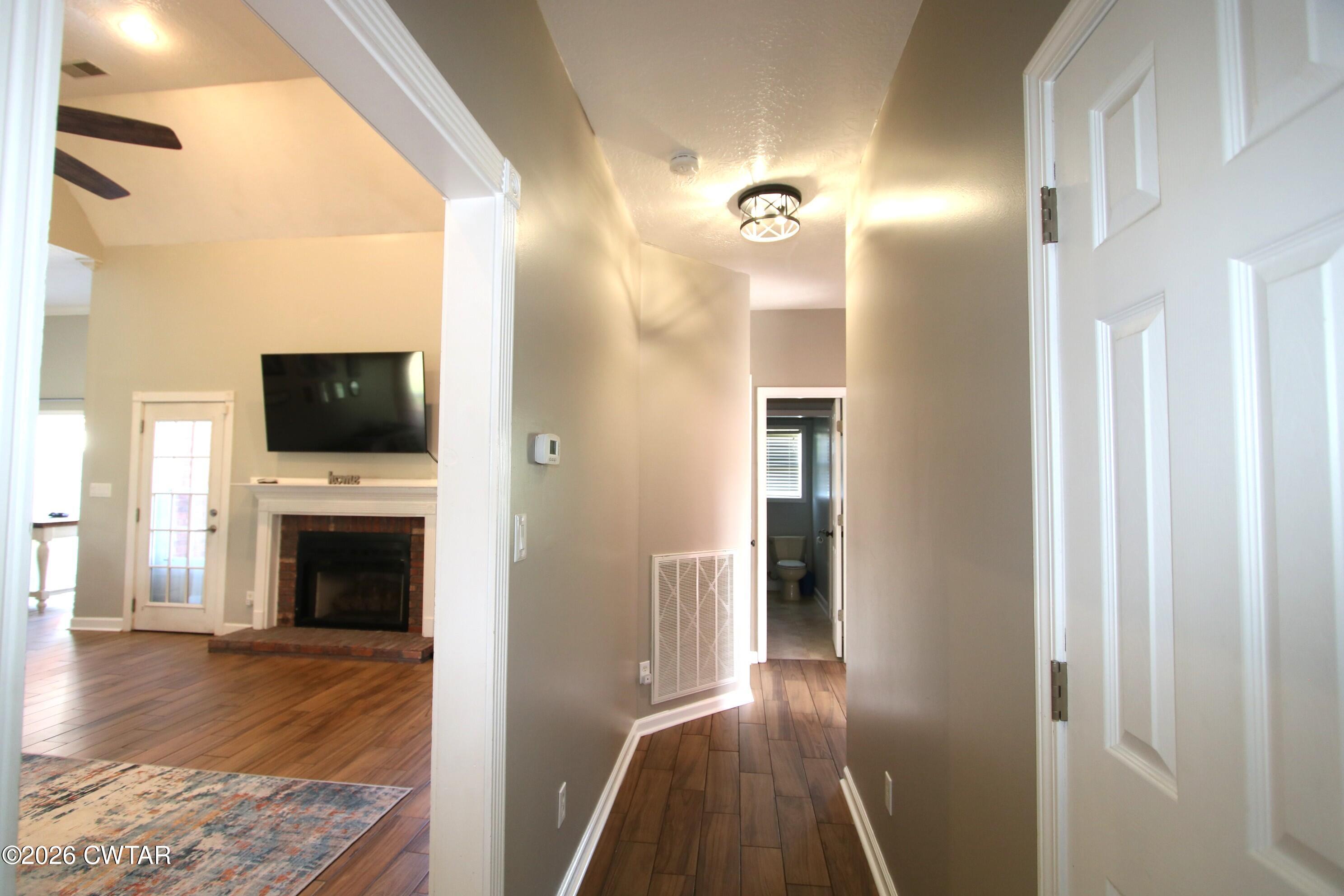 98 Browning Road Milan, TN 38358 - Photo 30 of 60 a view of a livingroom with a flat screen tv
