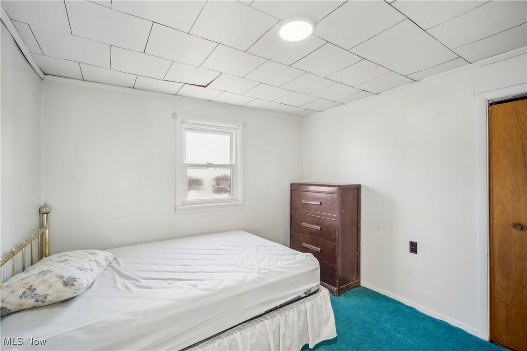754 Fettro Road Akron, OH 44312 - Photo 21 of 31 Bedroom featuring baseboards and carpet