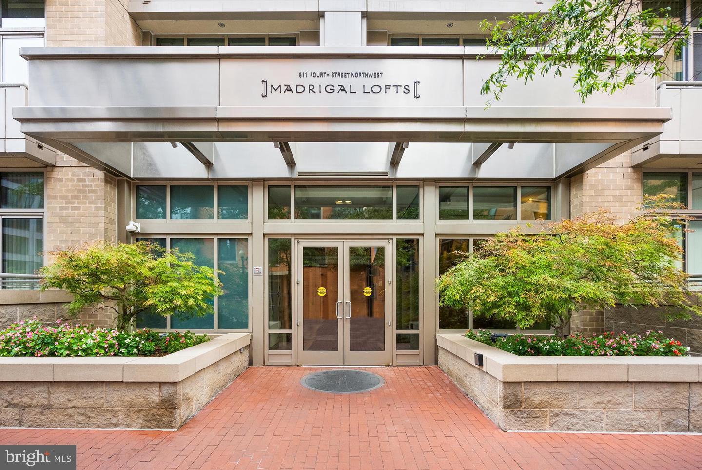 811 4th Street Northwest, Unit 1215 Washington, DC 20001 - Photo 2 of 32 a view of a house with potted plants