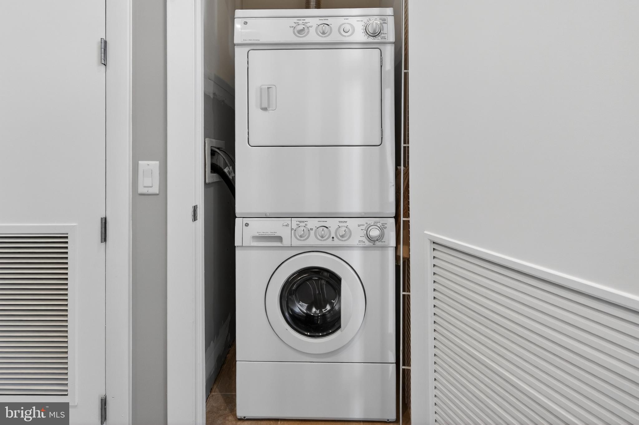 811 4th Street Northwest, Unit 1215 Washington, DC 20001 - Photo 21 of 32 a utility room with dryer and washer