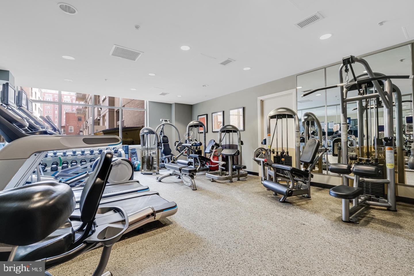 811 4th Street Northwest, Unit 1215 Washington, DC 20001 - Photo 22 of 32 a view of a room with gym equipment